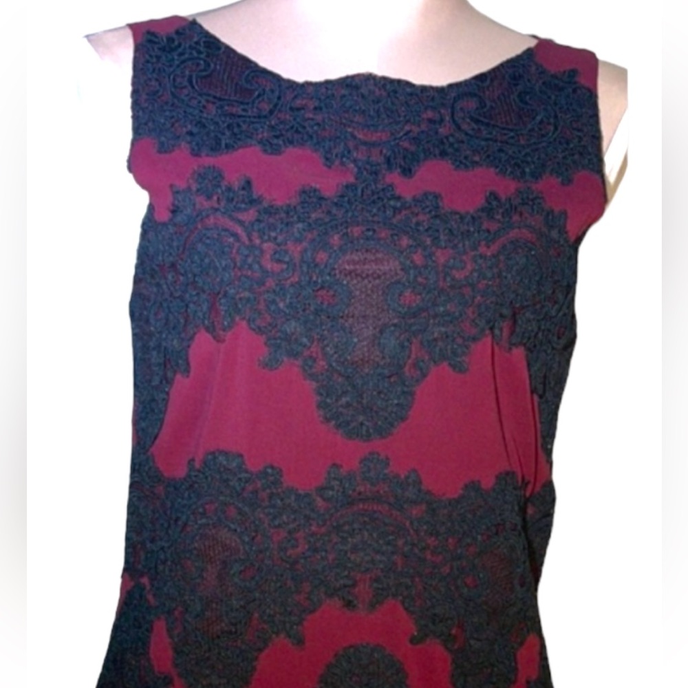 Alice + Olivia top. Size XS. Red sleeveless top with black lace overlay.